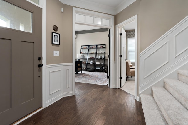 6196 Streamside Dr, Galena, OH 43021 - foyer entrance with dark wood finished floors, ornamental molding, stairs, a decorative wall, and a wainscoted wall