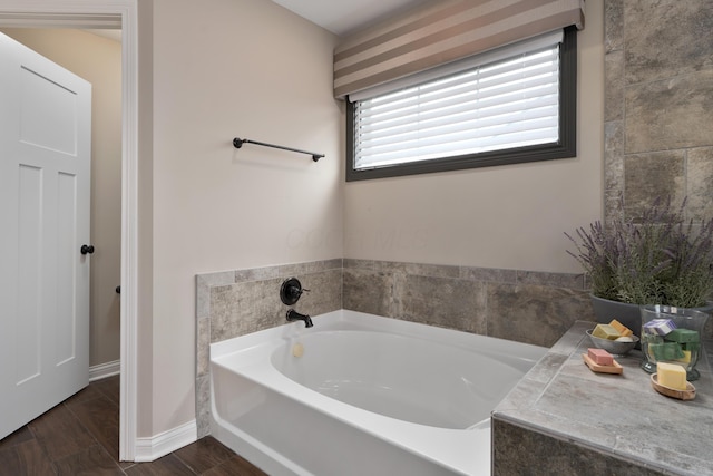 6196 Streamside Dr, Galena, OH 43021 - bathroom with a bath and wood finished floors