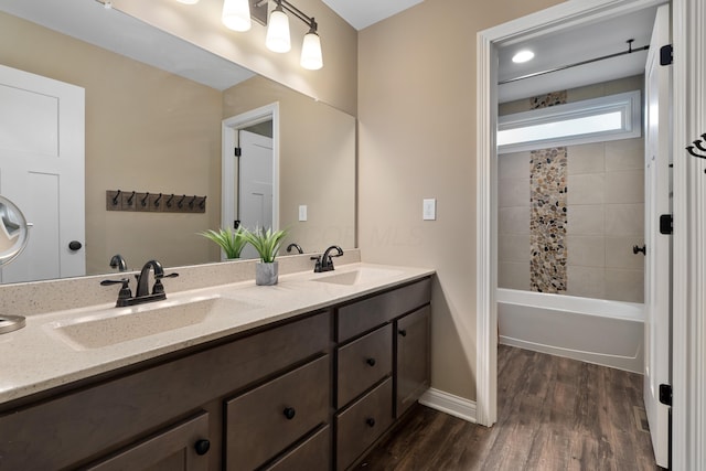 6196 Streamside Dr, Galena, OH 43021 - full bath with double vanity, wood finished floors, and washtub / shower combination