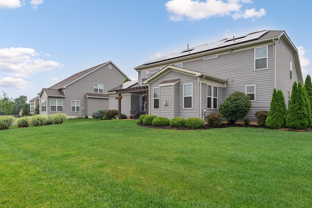 6196 Streamside Dr, Galena, OH 43021 - back of property featuring roof mounted solar panels, a pergola, and a lawn