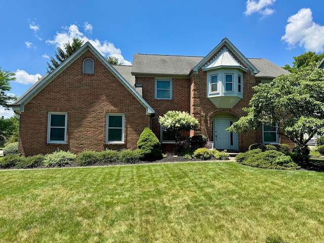 305 Sterling Ct, Westerville, OH 43082 - view of front facade featuring a front lawn and brick siding