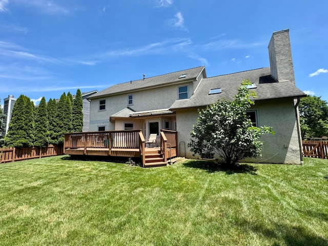 305 Sterling Ct, Westerville, OH 43082 - back of house with stucco siding, a deck, and a chimney
