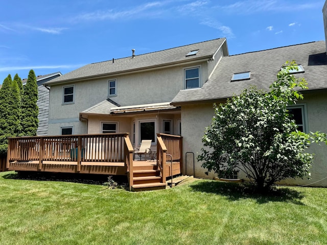305 Sterling Ct, Westerville, OH 43082 - back of property with stucco siding, a lawn, a deck, and roof with shingles