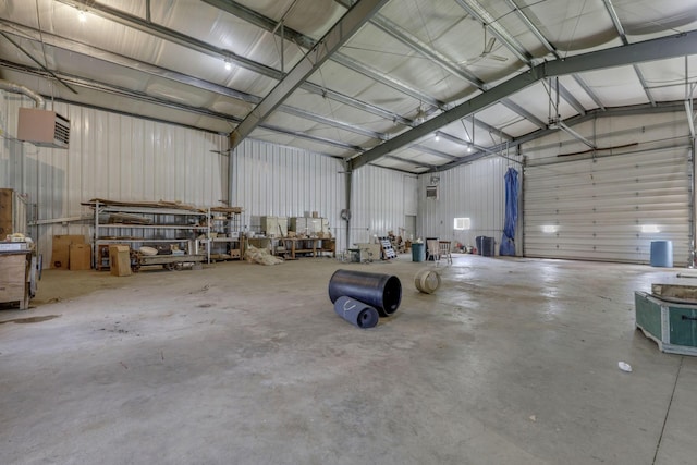 6135 Westfall Rd SW, Lancaster, OH 43130 - garage featuring metal wall and a garage door opener