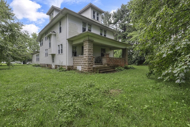 6135 Westfall Rd SW, Lancaster, OH 43130 - view of side of property featuring a porch and a lawn