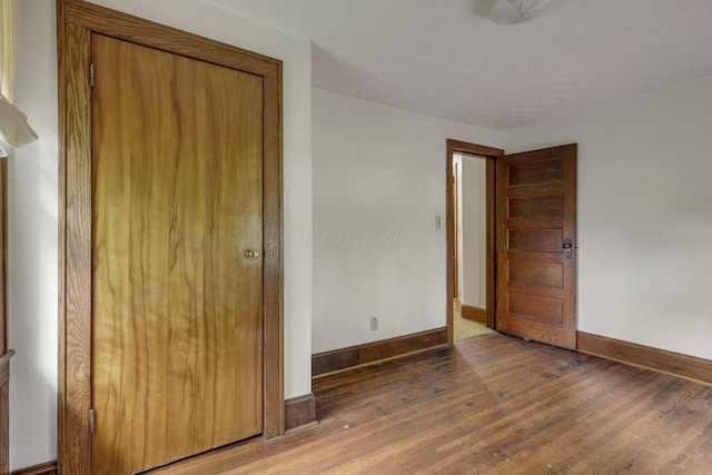 6135 Westfall Rd SW, Lancaster, OH 43130 - unfurnished bedroom with wood finished floors and baseboards