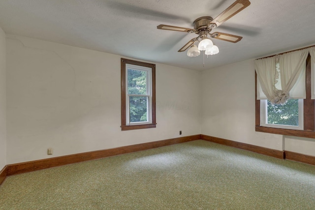 6135 Westfall Rd SW, Lancaster, OH 43130 - unfurnished room with carpet floors, ceiling fan, and a textured ceiling