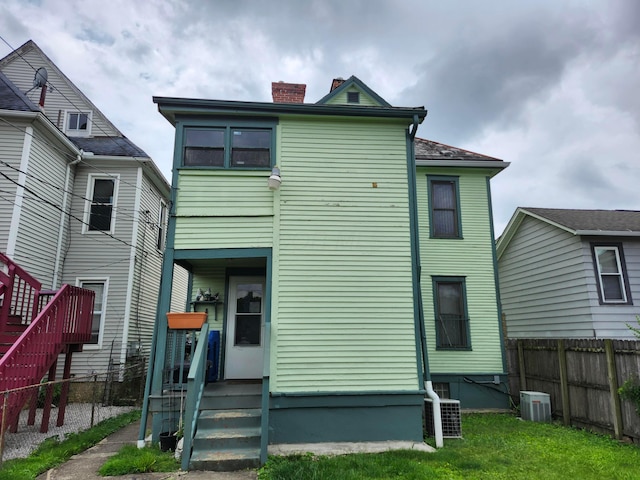 1058 Fair Ave, Columbus, OH 43205 - rear view of property with a chimney