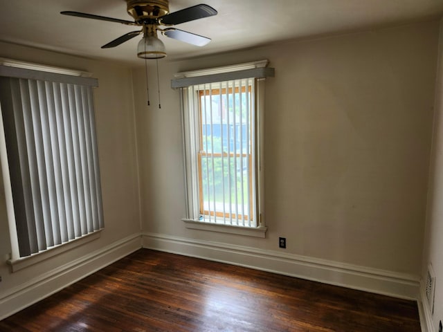 1058 Fair Ave, Columbus, OH 43205 - spare room featuring dark wood-style floors and ceiling fan