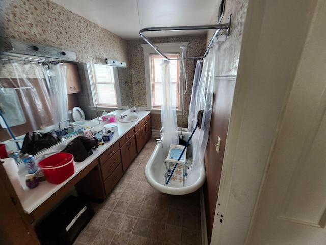 1058 Fair Ave, Columbus, OH 43205 - full bathroom featuring wallpapered walls and double vanity