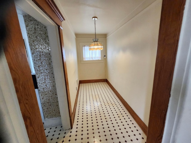 1058 Fair Ave, Columbus, OH 43205 - hall featuring a chandelier and baseboards