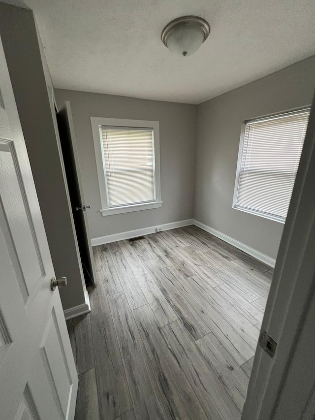 1116-1122 Cole St, Columbus, OH 43205 - unfurnished bedroom featuring wood finished floors