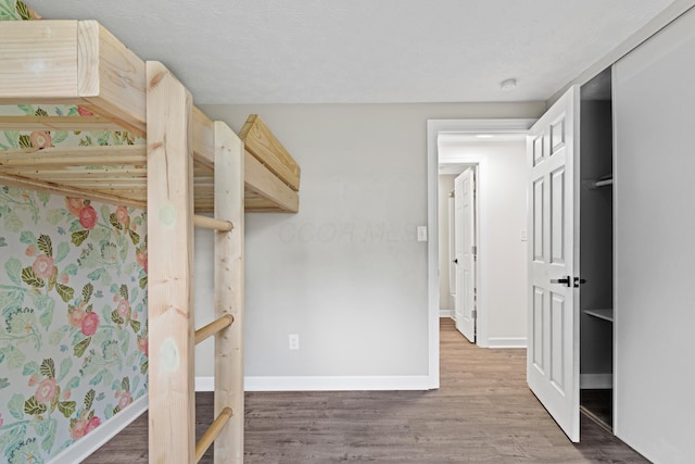 4400 Yellowhammer Dr, Westerville, OH 43081 - unfurnished bedroom featuring wood finished floors and baseboards