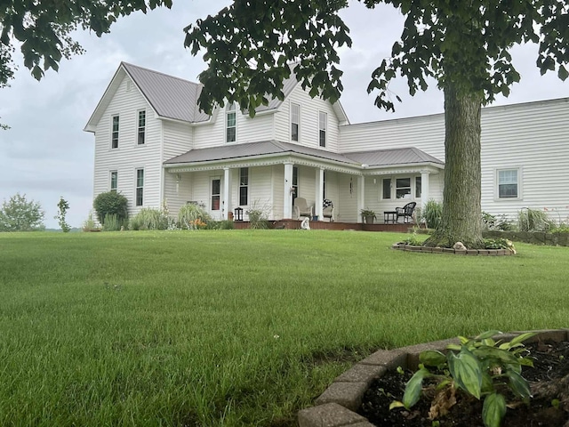 8672 Larue Green Camp Rd E, La Rue, OH 43332 - view of front of home featuring a porch, a front yard, and a metal roof