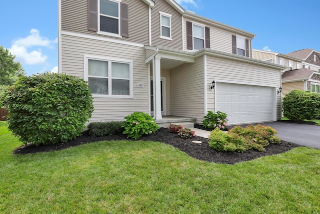 3987 Mad River Rd, Grove City, OH 43123 - view of front facade featuring a garage, a front lawn, and driveway