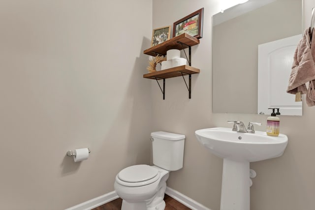 3987 Mad River Rd, Grove City, OH 43123 - bathroom with toilet and wood finished floors