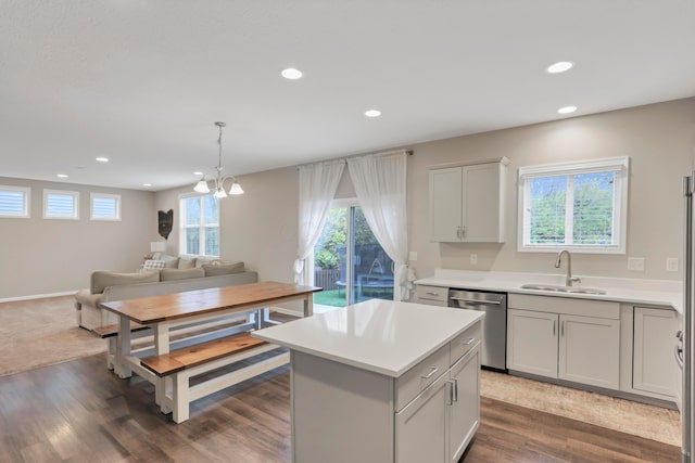3987 Mad River Rd, Grove City, OH 43123 - kitchen featuring stainless steel dishwasher, recessed lighting, a kitchen island, light countertops, and open floor plan