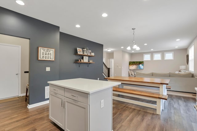 3987 Mad River Rd, Grove City, OH 43123 - kitchen with a center island, recessed lighting, open floor plan, light countertops, and wood finished floors