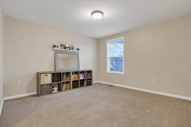 3987 Mad River Rd, Grove City, OH 43123 - carpeted empty room with baseboards and a textured ceiling