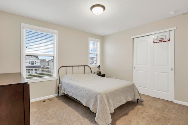 3987 Mad River Rd, Grove City, OH 43123 - bedroom with light colored carpet and a closet