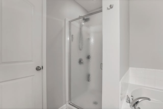 3987 Mad River Rd, Grove City, OH 43123 - bathroom featuring a stall shower and a bath