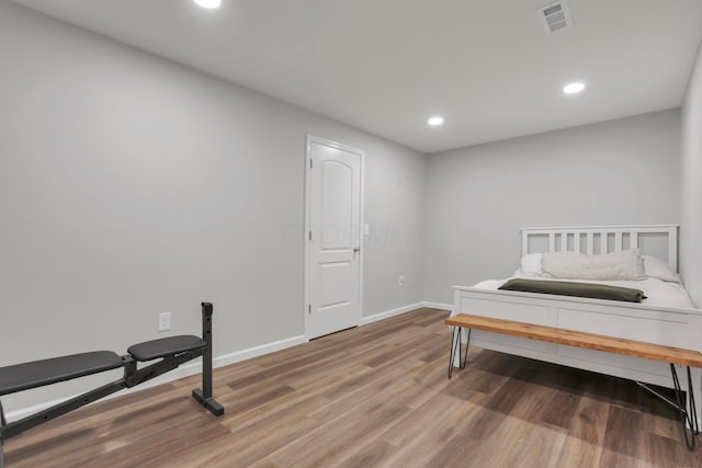 3987 Mad River Rd, Grove City, OH 43123 - bedroom with wood finished floors and recessed lighting