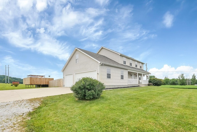 2110 Pickerington Rd, Carroll, OH 43112 - view of home's exterior featuring concrete driveway, a garage, a porch, and a shingled roof