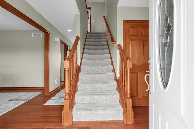 2110 Pickerington Rd, Carroll, OH 43112 - stairs with wood finished floors and recessed lighting