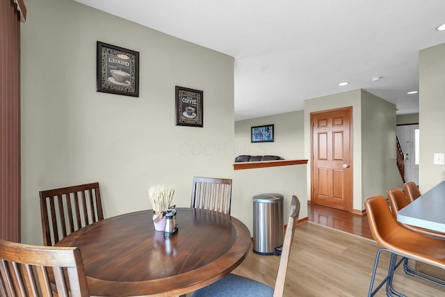 2110 Pickerington Rd, Carroll, OH 43112 - dining room with wood finished floors and recessed lighting