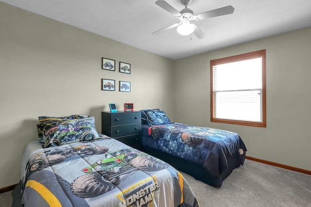 2110 Pickerington Rd, Carroll, OH 43112 - carpeted bedroom with baseboards and ceiling fan