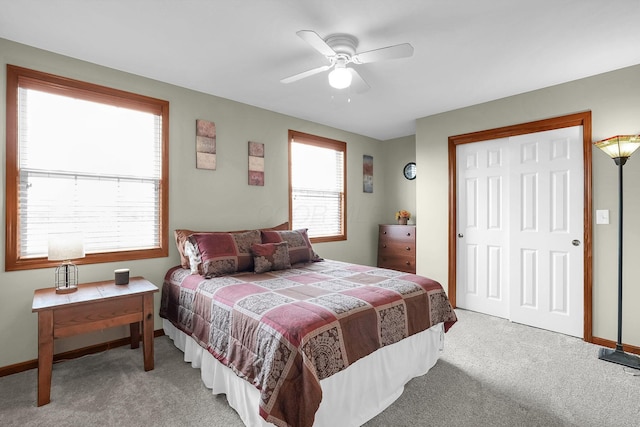 2110 Pickerington Rd, Carroll, OH 43112 - bedroom with light colored carpet, a ceiling fan, and a closet