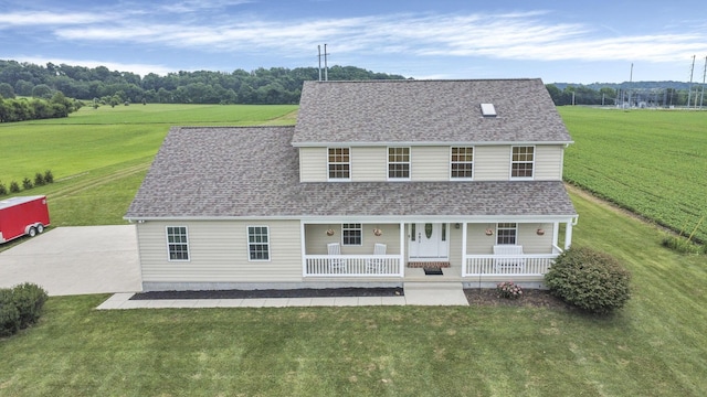 2110 Pickerington Rd, Carroll, OH 43112 - view of front of home featuring covered porch, a front lawn, and a shingled roof