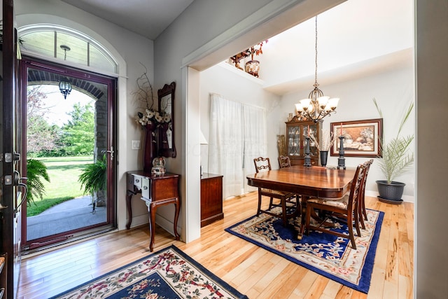8150 Concord Rd, Delaware, OH 43015 - dining area with light wood-type flooring and a chandelier