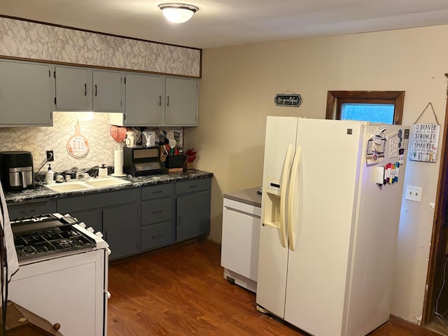 407 Marion St Unit 403, Mcguffey, OH 45859 - kitchen featuring white appliances, dark wood-style floors, gray cabinets, and decorative backsplash