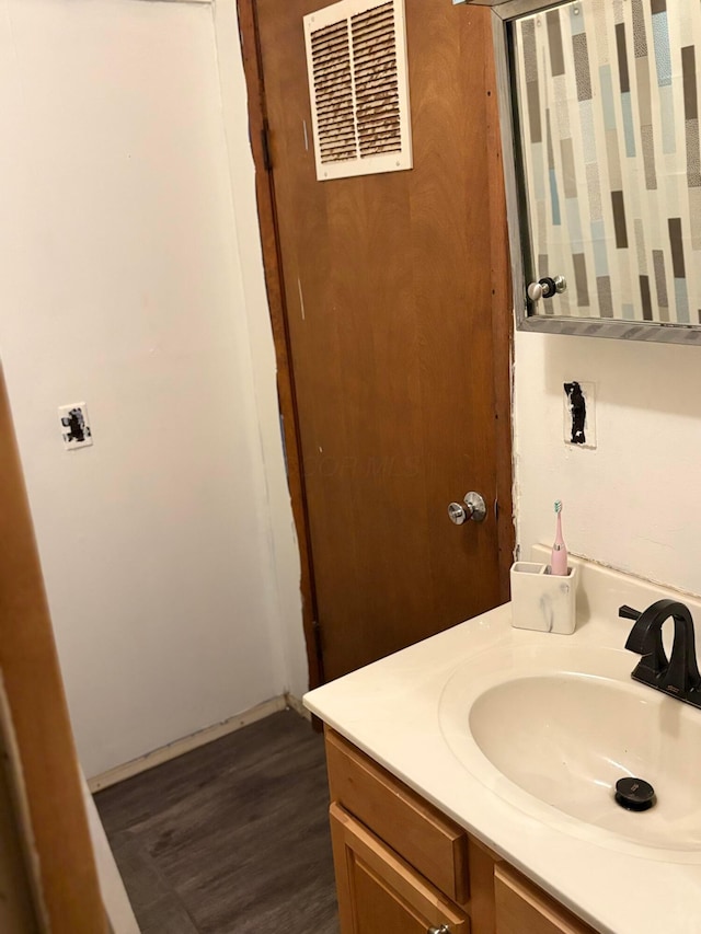 407 Marion St Unit 403, Mcguffey, OH 45859 - bathroom with vanity and wood finished floors