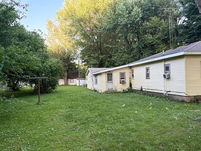 407 Marion St Unit 403, Mcguffey, OH 45859 - view of grassy yard featuring cooling unit