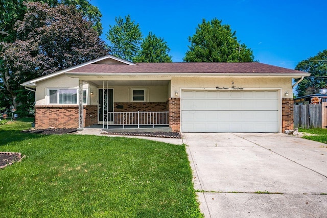 1914 Walden Dr, Columbus, OH 43229 - ranch-style home with brick siding, a garage, a porch, and driveway