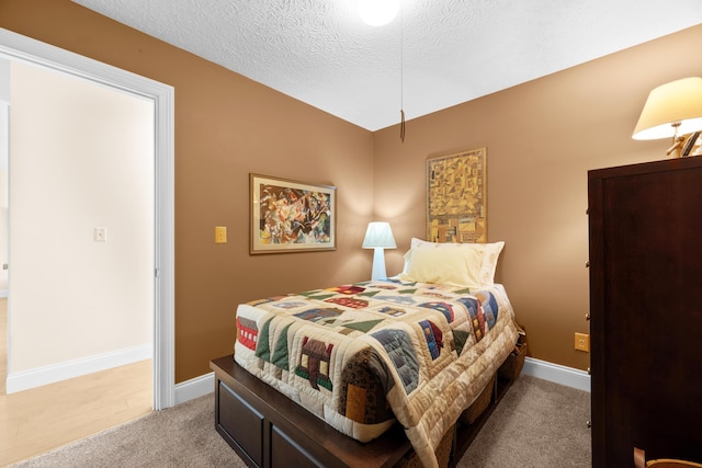 579 Buckeye Ln, Mount Gilead, OH 43338 - bedroom featuring light carpet and a textured ceiling