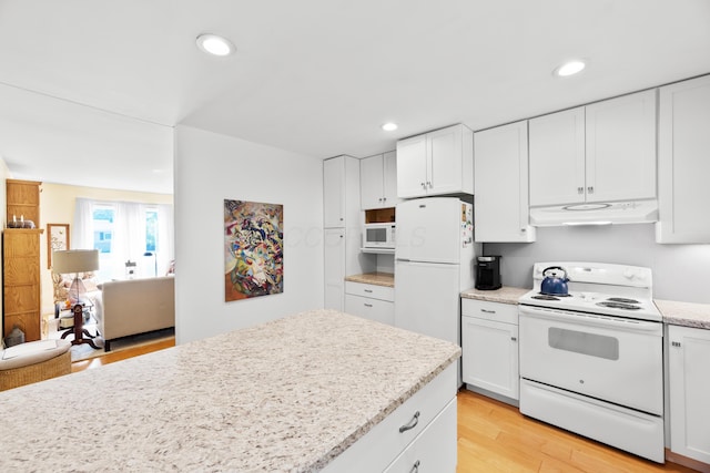 579 Buckeye Ln, Mount Gilead, OH 43338 - kitchen featuring white appliances, under cabinet range hood, recessed lighting, white cabinetry, and light wood-style flooring