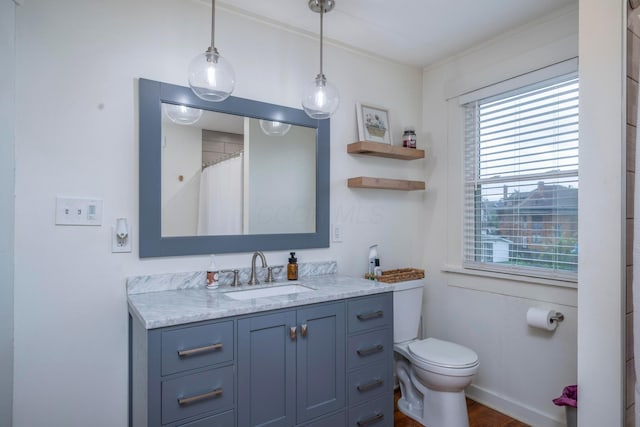 619 Columbus Ave, Washington Court House, OH 43160 - full bathroom featuring plenty of natural light, vanity, and wood finished floors