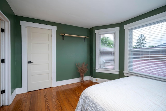 619 Columbus Ave, Washington Court House, OH 43160 - bedroom with baseboards and wood finished floors