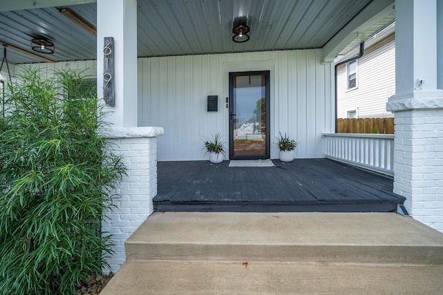619 Columbus Ave, Washington Court House, OH 43160 - view of exterior entry featuring board and batten siding and a porch