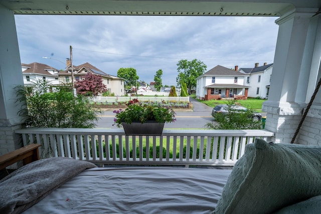 619 Columbus Ave, Washington Court House, OH 43160 - wooden porch featuring a residential view