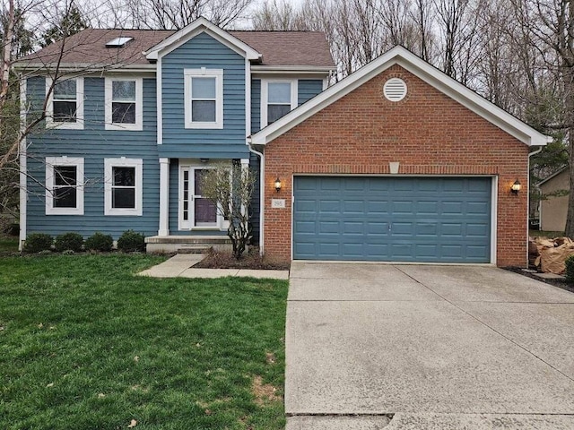 198 W Hull Dr, Delaware, OH 43015 - traditional-style house with concrete driveway, brick siding, a front yard, and a garage