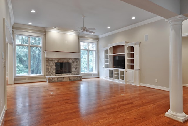 580 Keyes Ln, Worthington, OH 43085 - unfurnished living room with ornate columns, ceiling fan, ornamental molding, light wood-type flooring, and recessed lighting