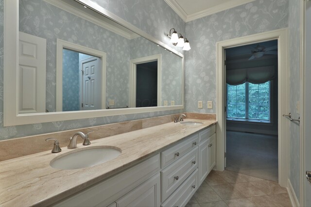 580 Keyes Ln, Worthington, OH 43085 - bathroom featuring double vanity, wallpapered walls, tile patterned floors, and crown molding