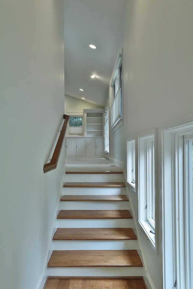 580 Keyes Ln, Worthington, OH 43085 - staircase with recessed lighting and high vaulted ceiling