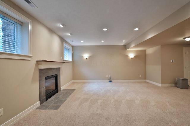 580 Keyes Ln, Worthington, OH 43085 - unfurnished living room featuring carpet floors, recessed lighting, and a fireplace