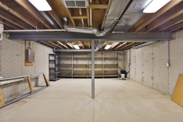 580 Keyes Ln, Worthington, OH 43085 - unfinished basement with brick wall and electric panel