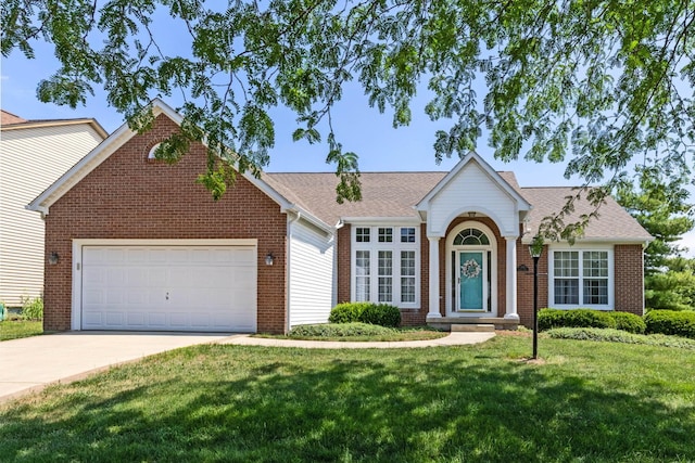 180 Locust Curve Dr, Delaware, OH 43015 - traditional home featuring brick siding, driveway, an attached garage, and a front lawn